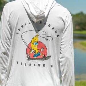 Person wearing "Lonely Banana Fishing" hoodie.